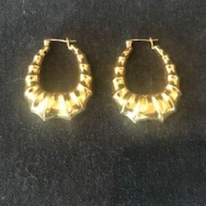 Gold plated hoop earrings.
